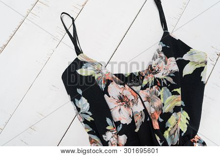 Kharkov, Ukraine - April 27, 2019: Part Of Black Floral Blouses With Shoulder Straps. Boohoo Tag