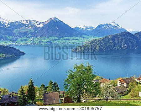 View Of Lake Lucerne Or Vierwaldstaetersee With Vitznau Settlement And Swiss Alps In The Background 