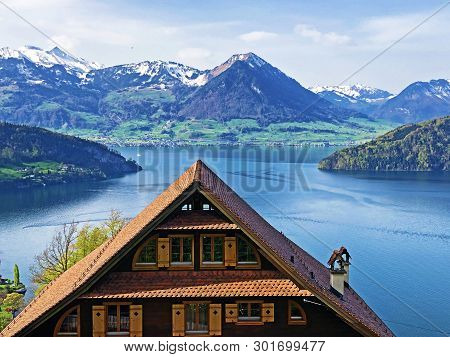 A View Of The Lake Lucerne Or Vierwaldstaetersee And Swiss Alps From The Vitznau Settlement - Canton
