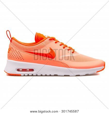 Vienna, Austria - August 10, 2017: Nike Air Max Thea Atomic Pink Sneaker On White Background.