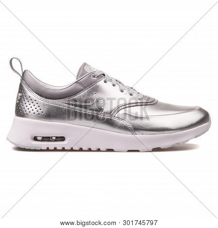 Vienna, Austria - August 10, 2017: Nike Air Max Thea Metallic Silver Sneaker On White Background.