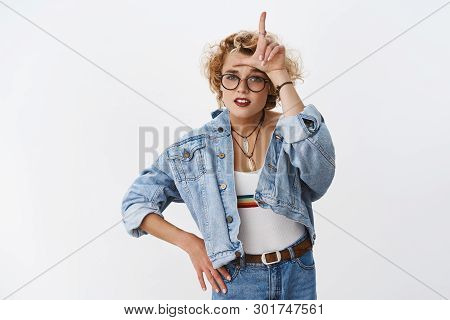Girl Looking With Dismay At Losers. Portrait Of Arrogant And Confident Good-looking Stylish Woman Wi