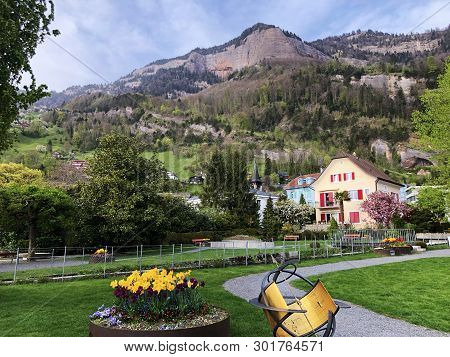 The Vitznau Village On The Slopes Of The Mountain And The Summit Of Vitznauerstock - Canton Of Lucer