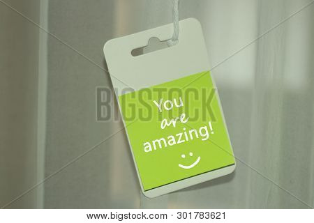 You Are Amazing. A Simple Message For Self Notes Reminder With Text On A Hanging Tag, Smiling Icon E