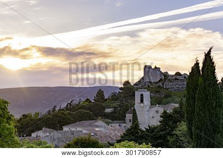 View On Traditional Medieval Houses And Castle Ruines In Provence During Sunrise, South Of France, V