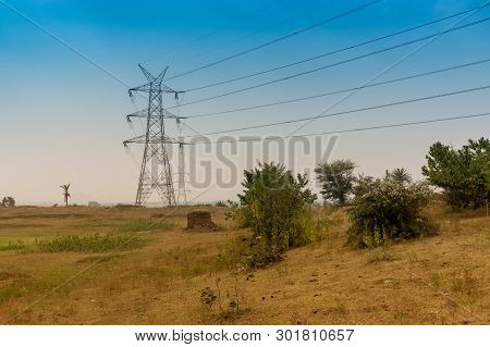 Electrical High Voltage Power Lines At Purulia, West Bengal, India. Electrical Power Is Distributed 