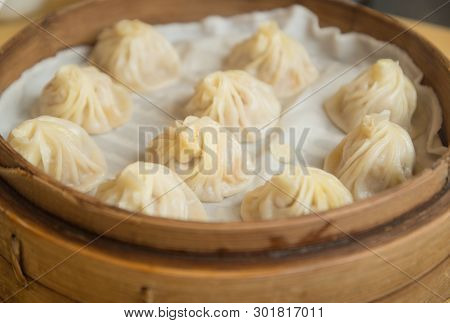 Xiaolongbao On Plate Dimsum. Dumpling.chinese Food Concept