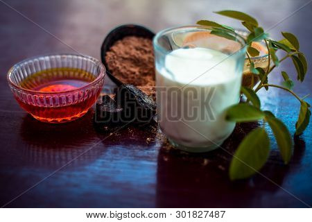 Face Mask Of Devil's Dung Powder On Wooden Surface I.e. Hing Powder Well Mixed With Honey And Milk.u