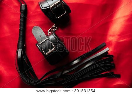 Leather Handcuffs And Black Whip For Sex Games In Bdsm Sex