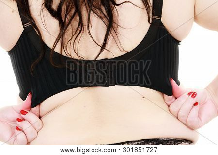 Woman Back View Putting On Her Bra Lingerie.