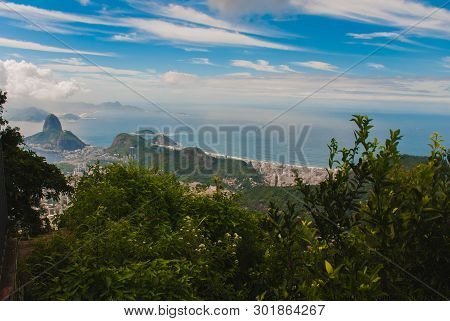 Rio De Janeiro, Sugar Loaf, Brazil: Mountain Resembling Inverted Funnel Behind Urca Hill. Tourist Si