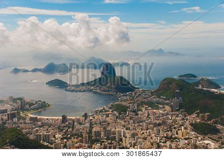 Rio De Janeiro, Sugar Loaf, Brazil: Mountain Resembling Inverted Funnel Behind Urca Hill. Tourist Si