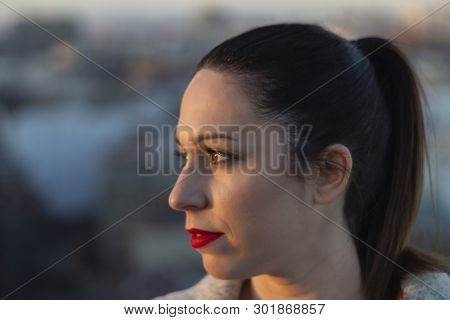 Girl Enjoying The Sunset
