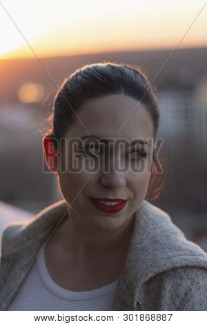 Girl Enjoying The Sunset