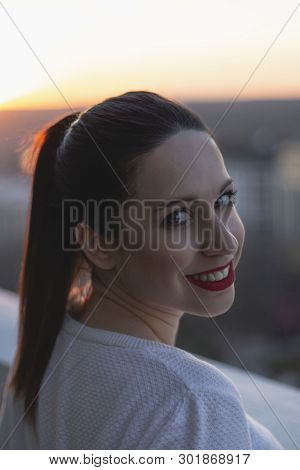 Girl Enjoying The Sunset