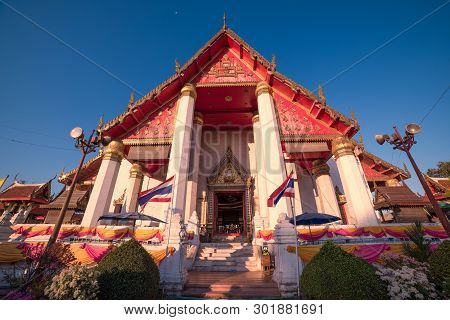 Ayutthaya, Thailand - January 2, 2016: Wat Mongkhon Bophit Temple With Thailand National Flags In Th