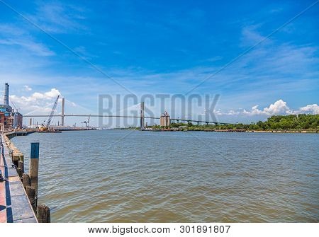 View Of The Sydney Lanier Bridge On The Savannah River With Local Architecture
