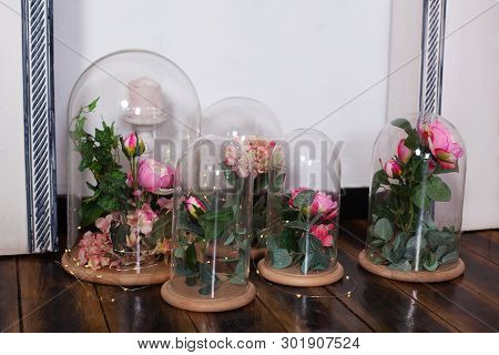 The Eternal Roses In The Flask, Several Roses. Long-lasting Rose In A Flask, In A Glass Dome, Stabil