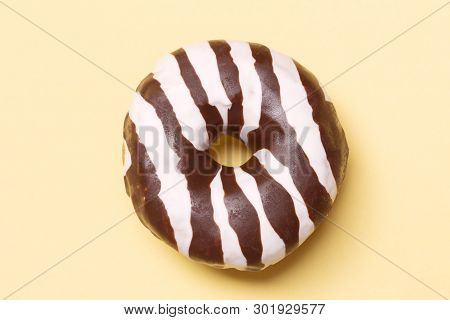 Chocolate Donnut On Yellow Background  - Top View