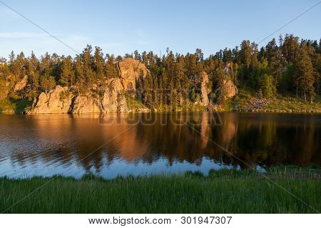 Golden Sunshine In The Late Afternoon Shines On A Quartz Rock Formation And Creates A Soft Reflectio