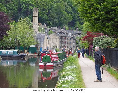 Hebden Bridge, West Yorkshire, England - 19 May 2019: People Watching The Arrival Of Narrow Boats Cl