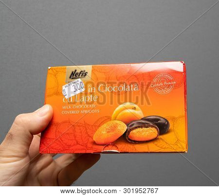 Paris, France - Apr 27, 2019: Man Holding Moldovan Sweets Manufactured By Nefis Apricot Chocolate Wi