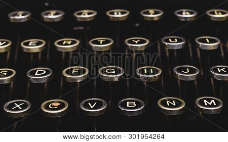 Vintage Antique Typewriter Keys On A Black Background Isolated