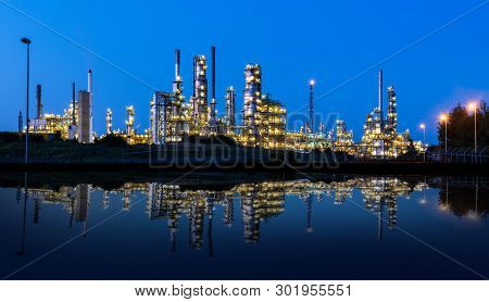 Powerful Lights On A Modern Factory At Night