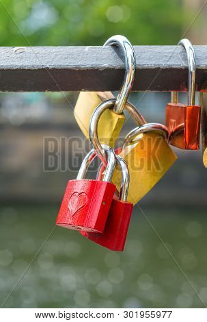 Close-up On Ocks On Historical Bridge Over River