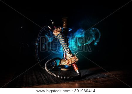Hookah Hot Coals On Shisha Bowl On Dark Foggy Background. Stylish Oriental Shisha.