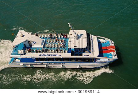 Barcelona, Spain - March 30, 2016: Pleasure Boat Visio Submarina Trimar With People On Deck In Sea. 