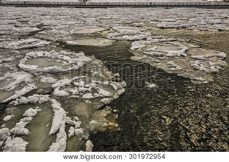 Pancake Ice Breaking Up In The Manistee River In March