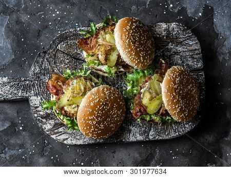 Classic Homemade Burger With Pork Cutlet, Bacon, Pickles, Fried Onions And Mayonnaise Mustard Sauce 