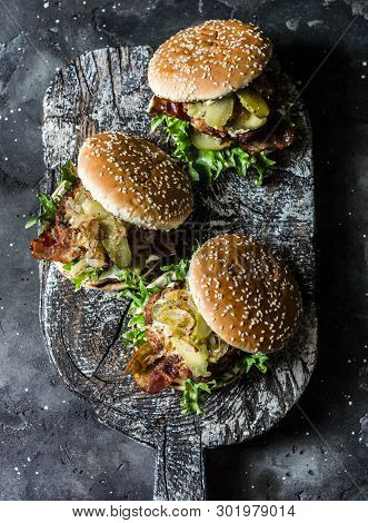 Classic Homemade Burger With Pork Cutlet, Bacon, Pickles, Fried Onions And Mayonnaise Mustard Sauce 