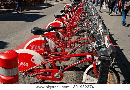 Barcelona, Spain - March 30, 2016: Bicycles For Rent. Viu Bicing Bikes. Public Transport Of Bicycle.