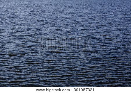 Light Playing On The Sea Surface. Water Surface. Sea Surface. Water Background. Blue Water Surface. 