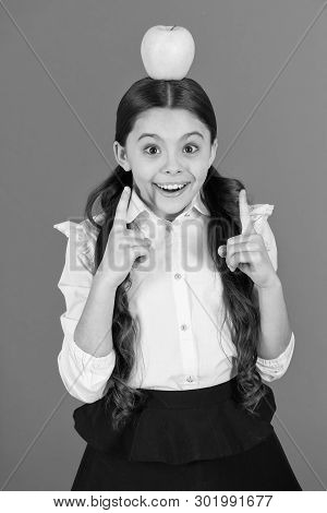 Eureka Concept. Distributing Free Fresh Fruit At School. Girl Kid School Uniform. Schoolgirl With Ap