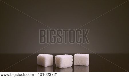 Pile Of Sugar Cubes On Isolated Background. Stock Footage. Pile Of Sugar Cubes Changes In Number On 