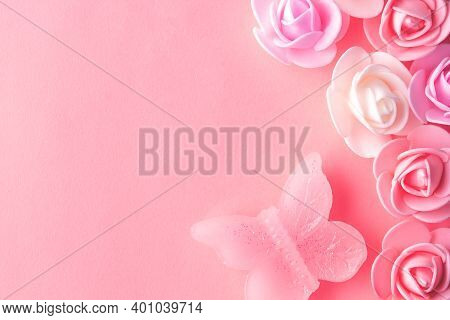 Flats On A Pink Background Lined With Small Flowers And A Butterfly