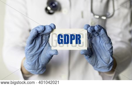 A Medical Worker In Gloves Holds A Card With The Words Gdpr (general Data Protection Regulation). Me