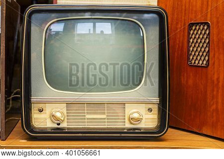 Vintage Television Set At The Shop. Old Television Set Is Placed In The Electrical Stores.