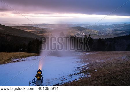 First Winter Snow Making. Snow Cannon At Evening Time. Rokytnice Nad Jizerou, Giant Mountains, Czech