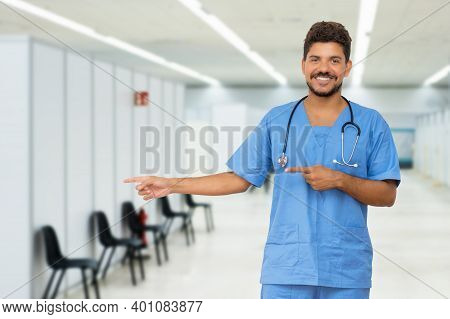 Friendly Doctor With Beard At Vaccination Station Is Ready For Vacinating Patients Against Coronavir