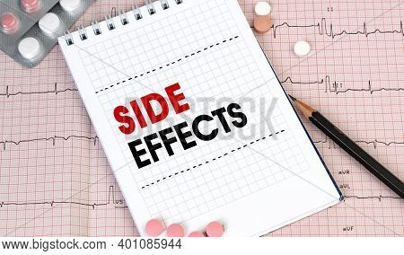 Notebook Page With Words - Side Effects Nearby With A Pills And Pencil, Medical Concept, Top View