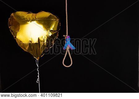 The Concept Of Bullying, Suicide. Rope Strangulation Loop On Black Background.