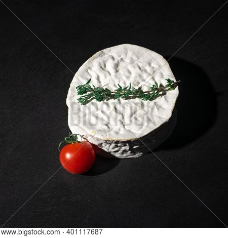 Brie Or Camembert Cheese Wheel On Black Slate Board. Square Image. Delicious Brie Cheese On Black Ba
