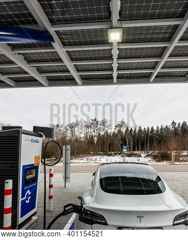 Rutesheim, Germany - December 27, 2020: Tesla Charging At The Newly Opened Electric Vehicle Charging