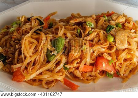 Pad Kee Mao Otherwise Known As Drunken Noodles Is A Spicy Thai Stir-fried Noodle Dish With Thinly Sl