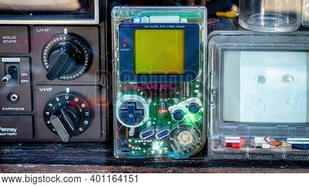 Nintendo Handheld Video Game Device Game Boy In A Shop Window Display With Transparent Cover