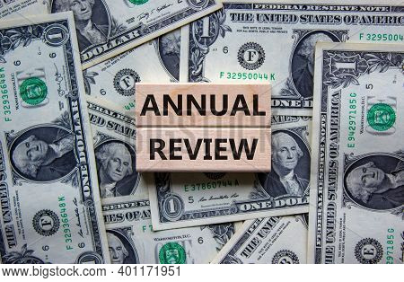 Annual Review Symbol. Concept Words 'annual Review' On Wooden Blocks On A Beautiful Background From 